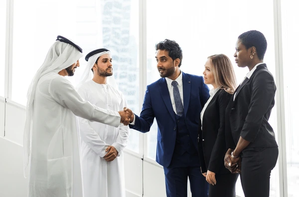 https://aipilot.io/wp-content/uploads/2025/07/mixed-business-team-dubai-meeting-600nw-2048792924.webp